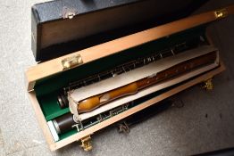 A selection of clarinet parts, wooden recorder etc