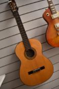A vintage Kasuga G-130 classical guitar, with hard case