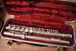 A traditional silvered flute, stamped Rushworths