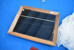 An oak frame wall display
