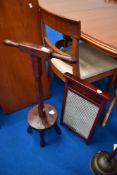A traditional washboard and wooden dolly