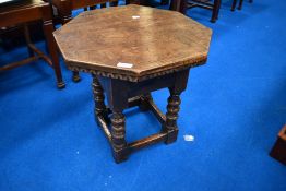 A good quality reproduction oak octagonal table with frieze drawer, possibly Titchmarsh and Goodwin