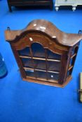 A vintage oak miniatures wall display