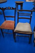 A Victorian mahogany bedroom chair and a later oak dining chair