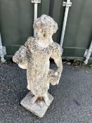 A concrete garden ornament, flower girl