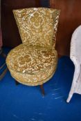 A vintage upholstered nursing chair