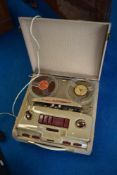 A vintage Slimline Three-Four reel to reel recorder