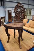 A Black Forest hall chair having naturalistic design