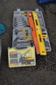 A spanner set, two levels and a staple gun