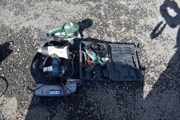 A selection of power tools including glue gun, detail sander etc