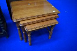 A modern yew effect nest of three tables