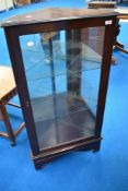 A vintage mahogany effect floor standing corner display