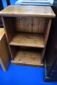 A vintage pine record or similar shelf unit