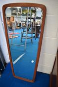 A vintage teak wall mirror, height approx. 96cm