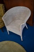 A vintage Lloyd Loom style tub chair