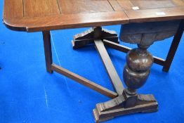 A mid 20th Century oak gateleg dining table