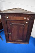 A 19th Century oak corner cupboard