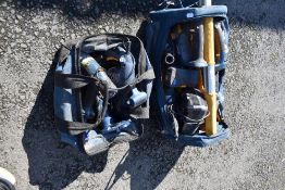Two tool bags containing large selection of power tools and batteries etc, mainly Ryobi