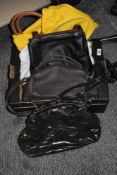 A variety of handbags, including brands such as Bulaggi, Marc Jacobs and Abbacino.