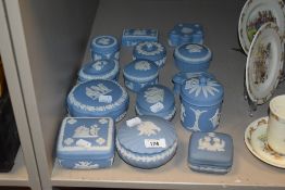 Fourteen Wedgwood Jasper ware trinket boxes.