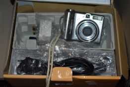 A AF-1 Olympus camera and and a Cannon power shot A70IS.
