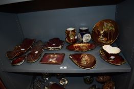 An assorted collection of Carlton Ware Rouge Royale, and a cobalt blue lidded vase