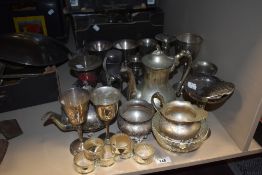 A selection of plated wear and similar, napkin rings, goblets, candlesticks etc to be included.
