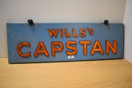 A Wills's Capstan cigarettes advertising sign, the lustre lettering on a blue enamelled ground,
