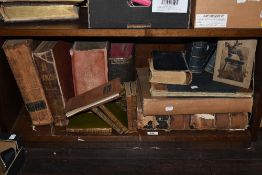 A shelf full of antique books, including the life of Samuel Boswell volumes, Punch (1841-42)