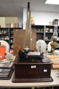 A 1900s Edison standard phonograph, with case and brass horn.