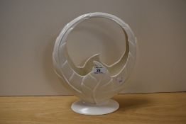 A Beswick leaf form basket vase, of Art Deco style, the base impressed with '819', measuring 30cm