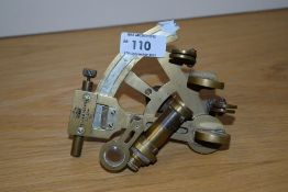 An early 20th century brass marine/nautical sextant, by Kelvin & Hughes 11.5cm