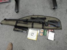 A Gamo HPA MI IGT .177 Air Rifle with Telescopic Sights, Pat No US9863741B2,on folding stand,