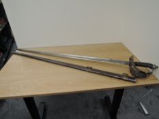 A Victorian Household Cavalry Officers Sword, Cipher on guard, decorated blade with Royal Cipher,