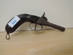 A 19th century Percussion Pistol, wooden grip, proof marks seen, barrel length 7cm, overall length