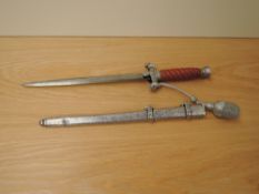 A German Third Reich Officers Dress Dagger by WKC Solingen, metal scabbard, portepee knot, blade