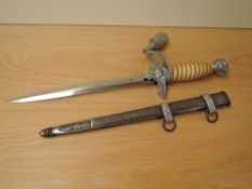 A German Third Reich Officers Dress Dagger by ROBt Klasse Solingen, metal scabbard, portepee knot,