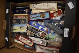 A collection of display tea spoons most in boxes