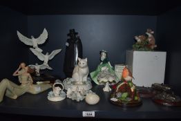 A Royal Worcester 'Holly' figurine, a Royal Mint Classics animal study 'The Doves in Flight' limited