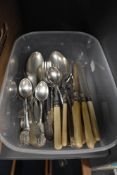 A small collection of flatware including fish knives and forks along with spoons