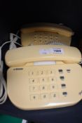 Two retro Betacom telephones.