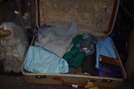 A selection of assorted ladies clothing including cashmere scarfs, smocks and jumpers and bags etc.