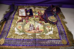 A Manchester Unity of Oddfellows fraternal sash and associated medallion and an apron of similar