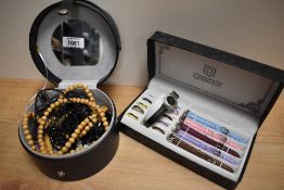 A small selection of necklaces and a Qbos boxed watch set