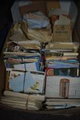 A selection of assorted postcards and ephemera.