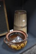 A Wetheriggs Penrith pottery tureen void of lid, having brown ground with yellow pattern, and a