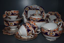 A Royal Grafton china tea service, in Imari colours, marked '5328' to the underside