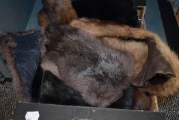A box of ladies vintage faux fur garments, to comprise two pairs of gloves and stoles