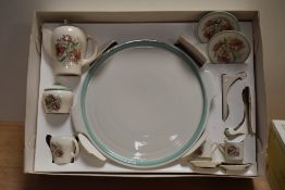 A Susie Cooper miniature tea set having a tiger lily pattern