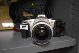 A Canon EOS300 camera No5165506 with Canon Zoom lens EF 28-90mm 1:4-5,6 in soft camera case with